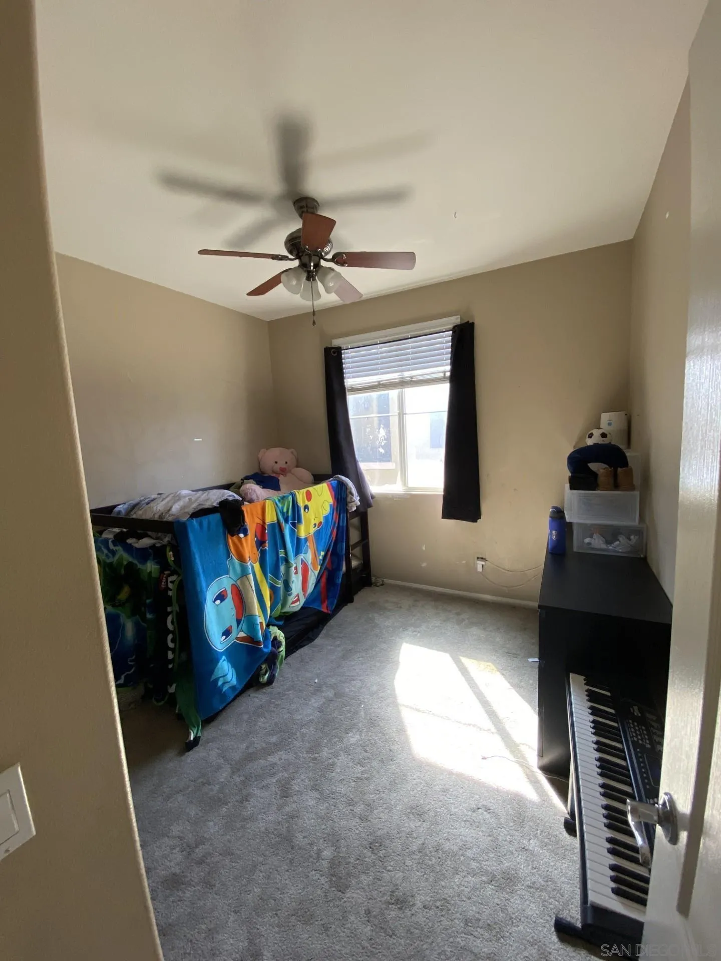 64 Via Sovana Santee, CA 92071 - Photo 8 of 15 a bedroom with furniture and a window