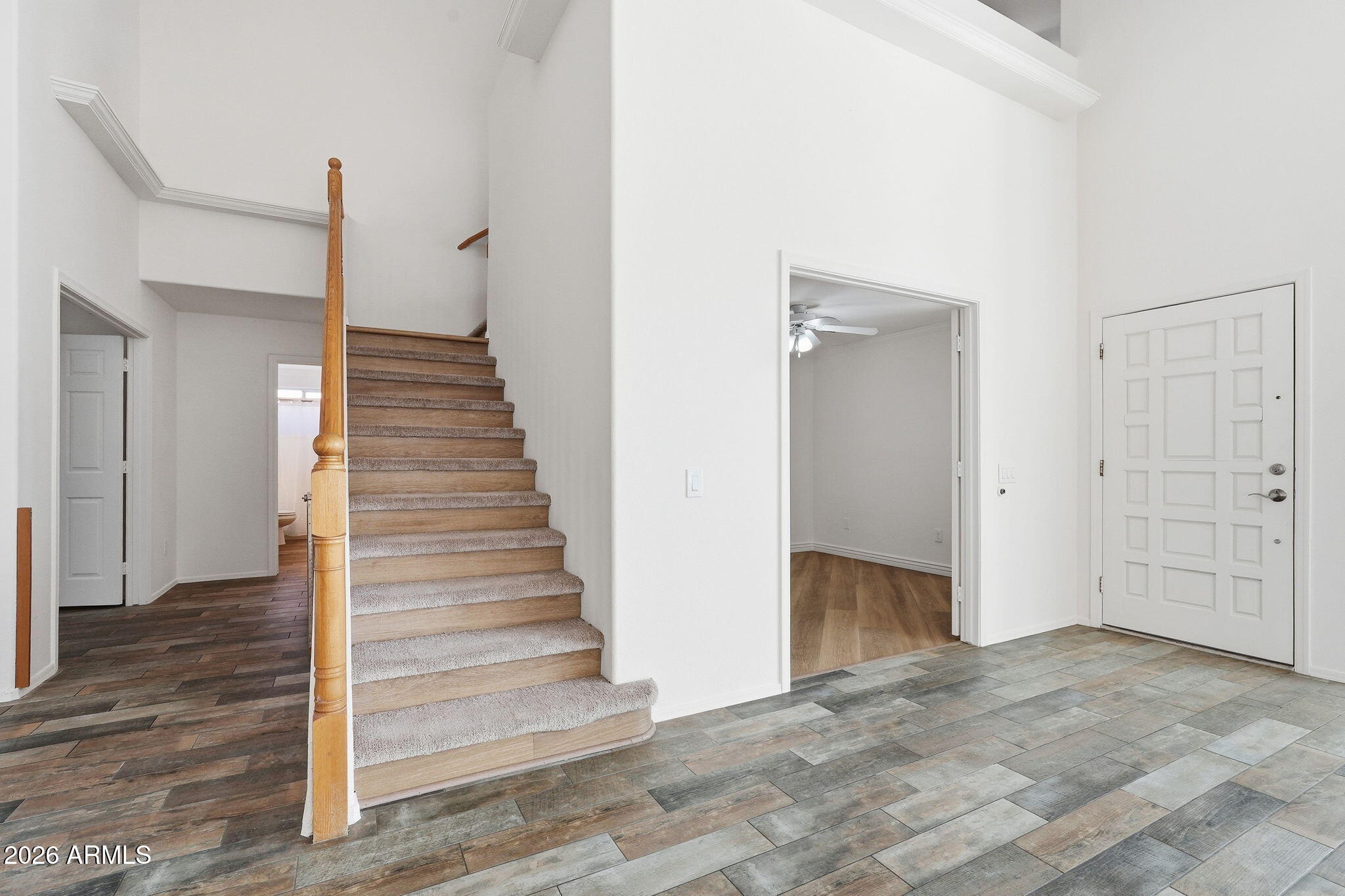 742 North Boulder Street Gilbert, AZ 85234 - Photo 15 of 22 a view of a hallway with wooden floor and entryway