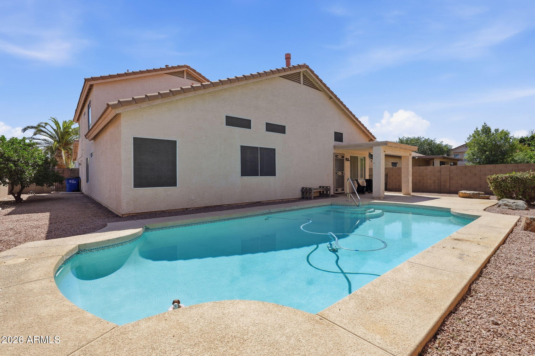 742 North Boulder Street Gilbert, AZ 85234 - Photo 22 of 22 a view of a house with a yard