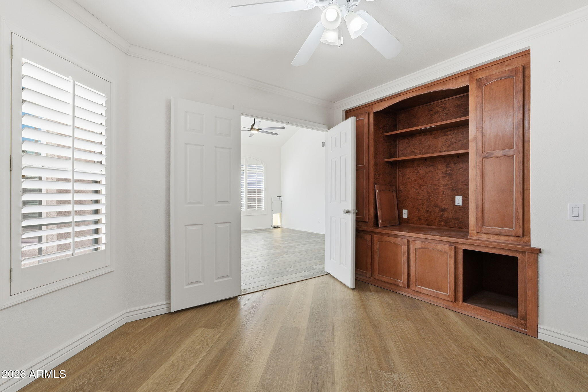 742 North Boulder Street Gilbert, AZ 85234 - Photo 4 of 22 a view of an empty room with cabinet and a window