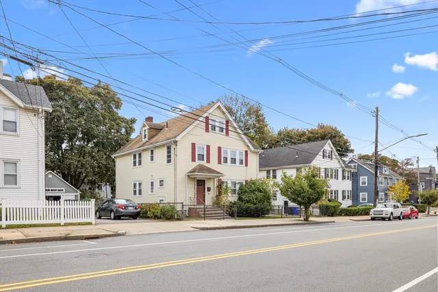 a view of a building and a street