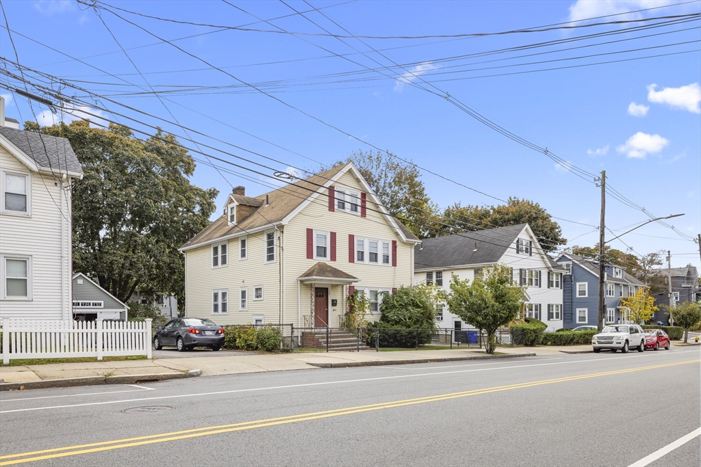 180 Faneuil Street, Unit 2 Boston, MA 02135 - Photo 1 of 37 a view of a building and a street