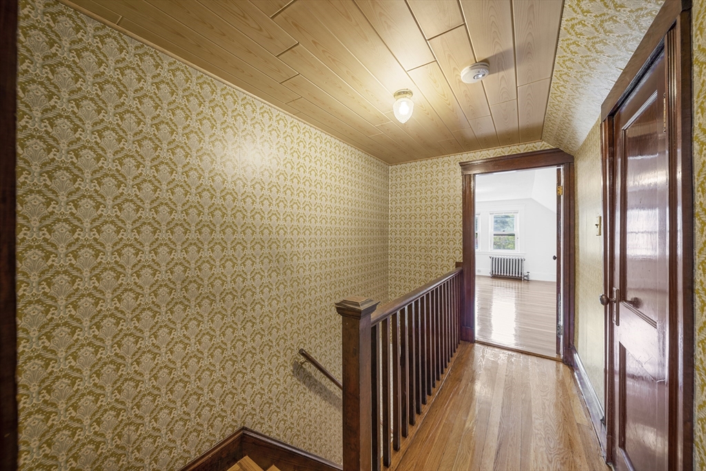 180 Faneuil Street, Unit 2 Boston, MA 02135 - Photo 21 of 37 a view of a hallway