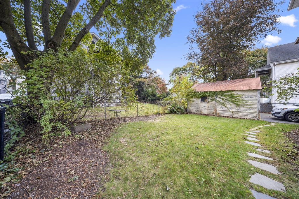 180 Faneuil Street, Unit 2 Boston, MA 02135 - Photo 33 of 37 a view of a back yard