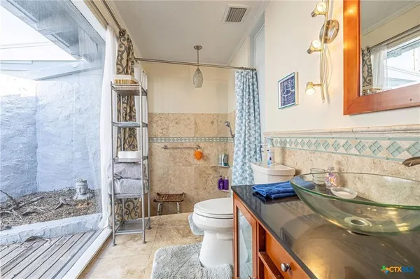 a view of kitchen with dining table and chairs