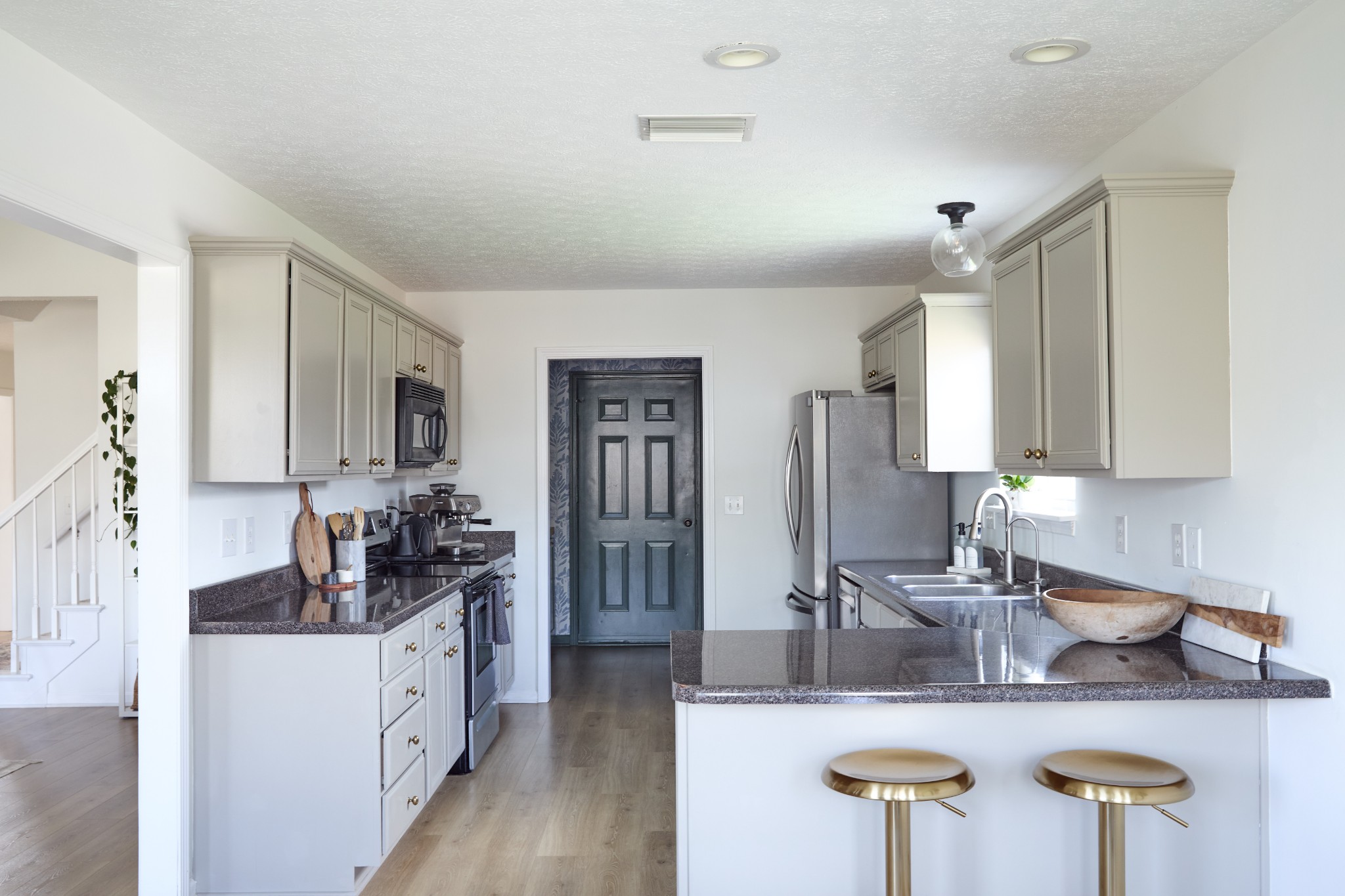 1910 Portview Drive Spring Hill, TN 37174 - Photo 12 of 50 a kitchen with counter top space cabinets and stainless steel appliances