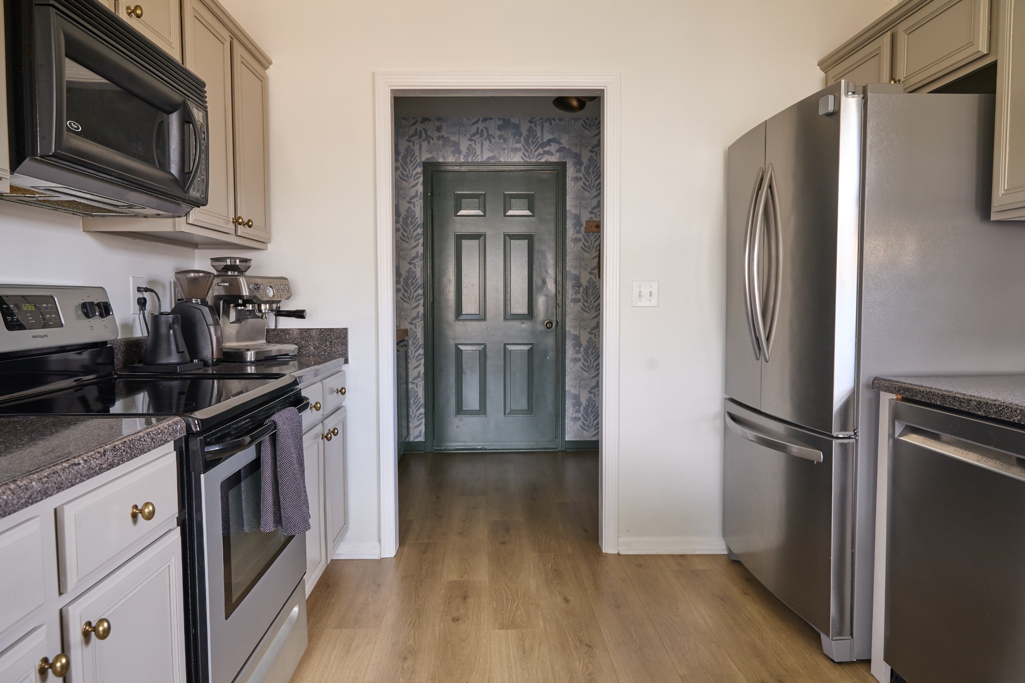 1910 Portview Drive Spring Hill, TN 37174 - Photo 13 of 50 a kitchen with stainless steel appliances a refrigerator stove and microwave