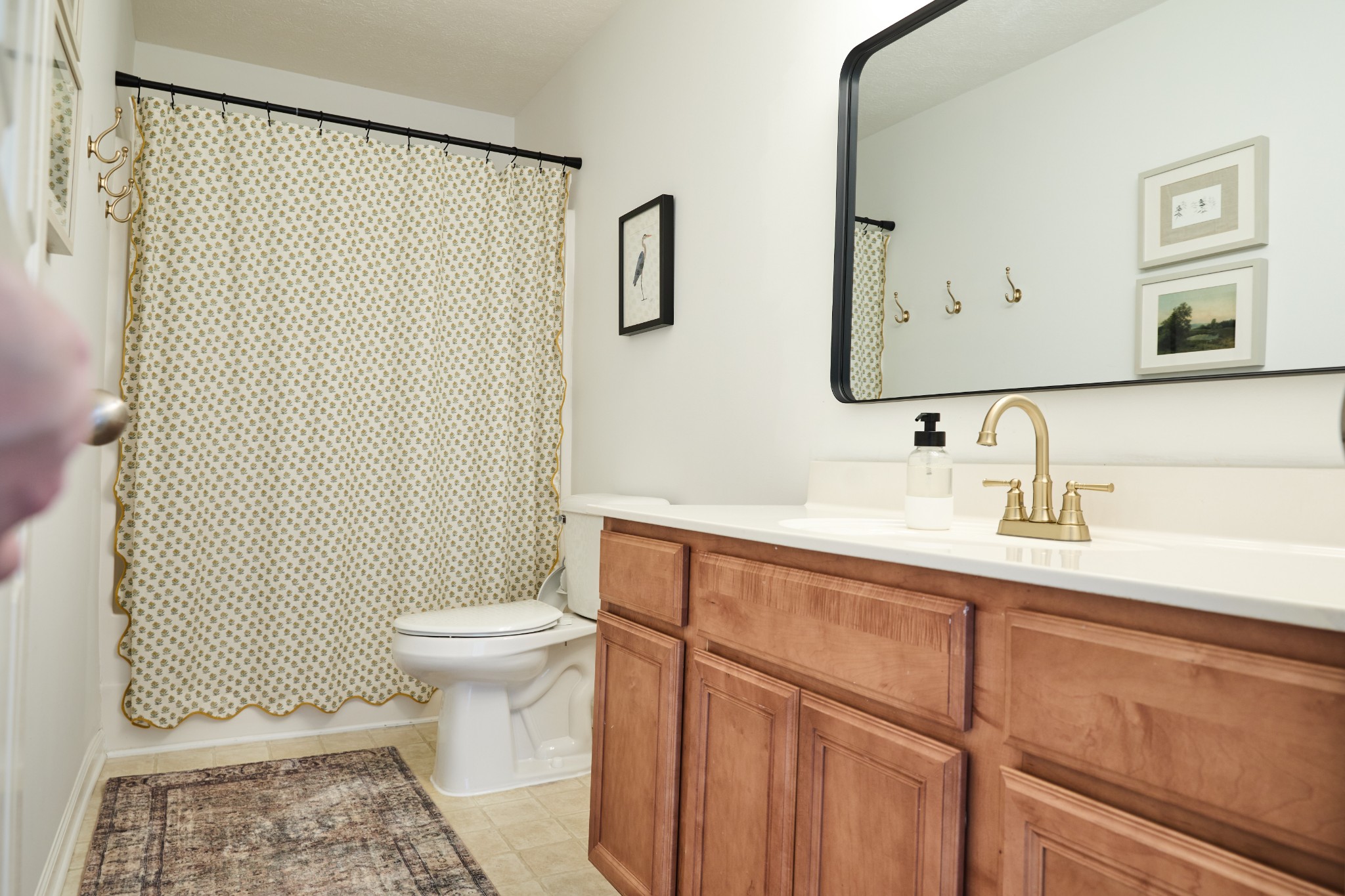 1910 Portview Drive Spring Hill, TN 37174 - Photo 22 of 50 a bathroom with a sink a toilet and mirror