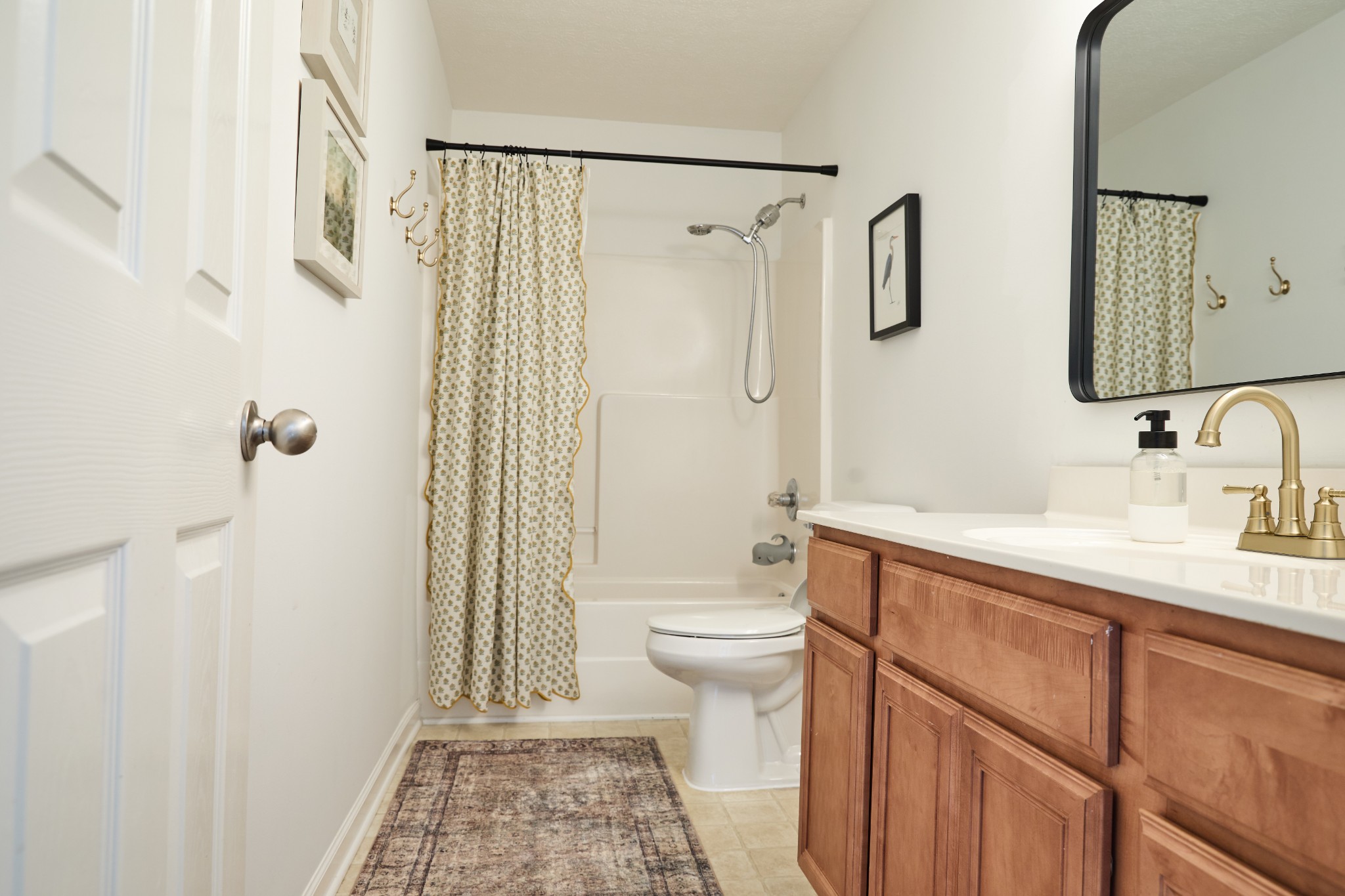 1910 Portview Drive Spring Hill, TN 37174 - Photo 23 of 50 a bathroom with a sink a toilet and shower