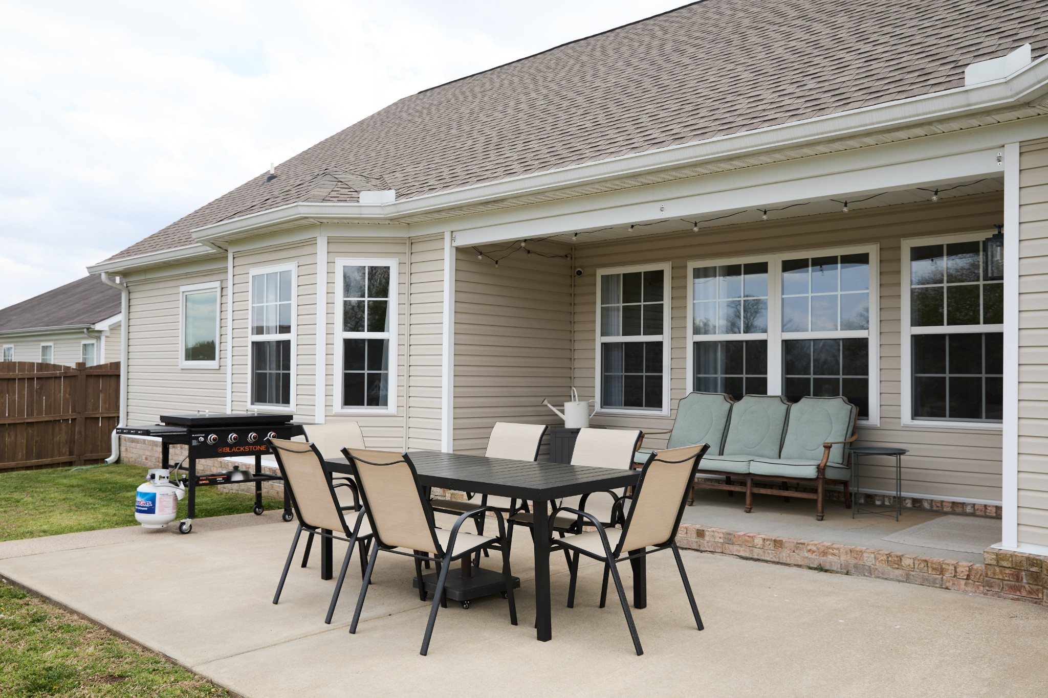 1910 Portview Drive Spring Hill, TN 37174 - Photo 39 of 50 a view of a patio with table and chairs