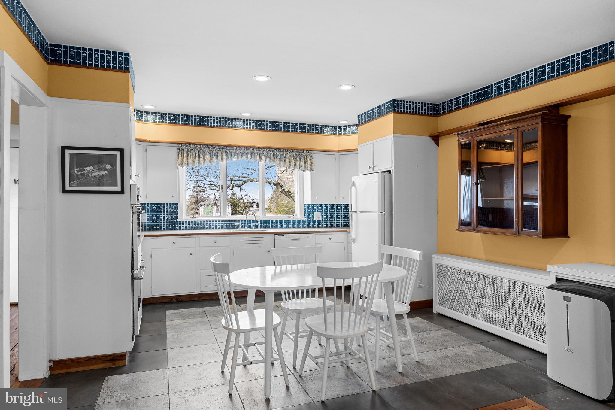 53 Arneys Mt Road Pemberton, NJ 08068 - Photo 12 of 61 a dining area with a table and chairs