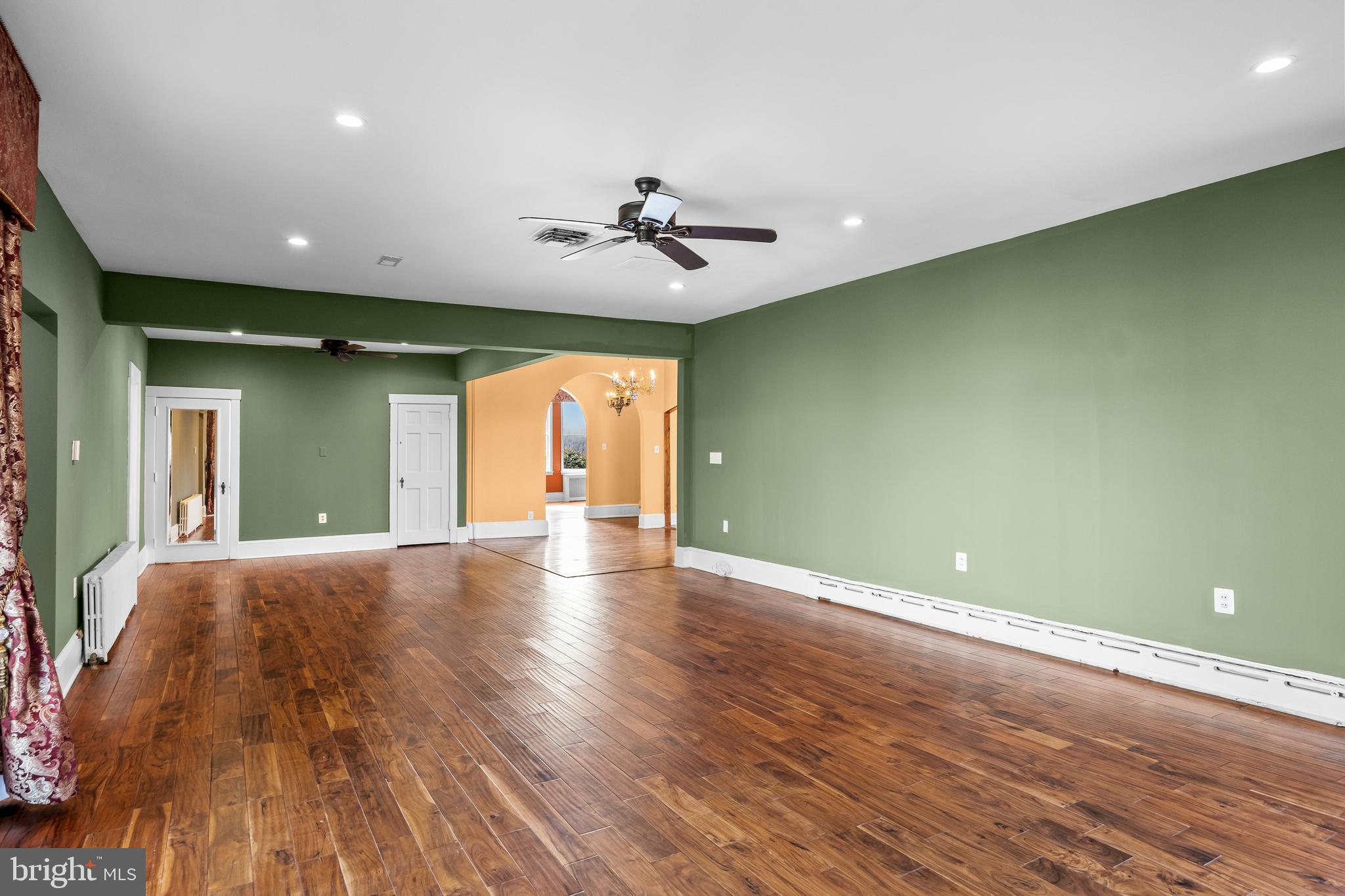 53 Arneys Mt Road Pemberton, NJ 08068 - Photo 19 of 61 a view of an empty room with window and wooden floor