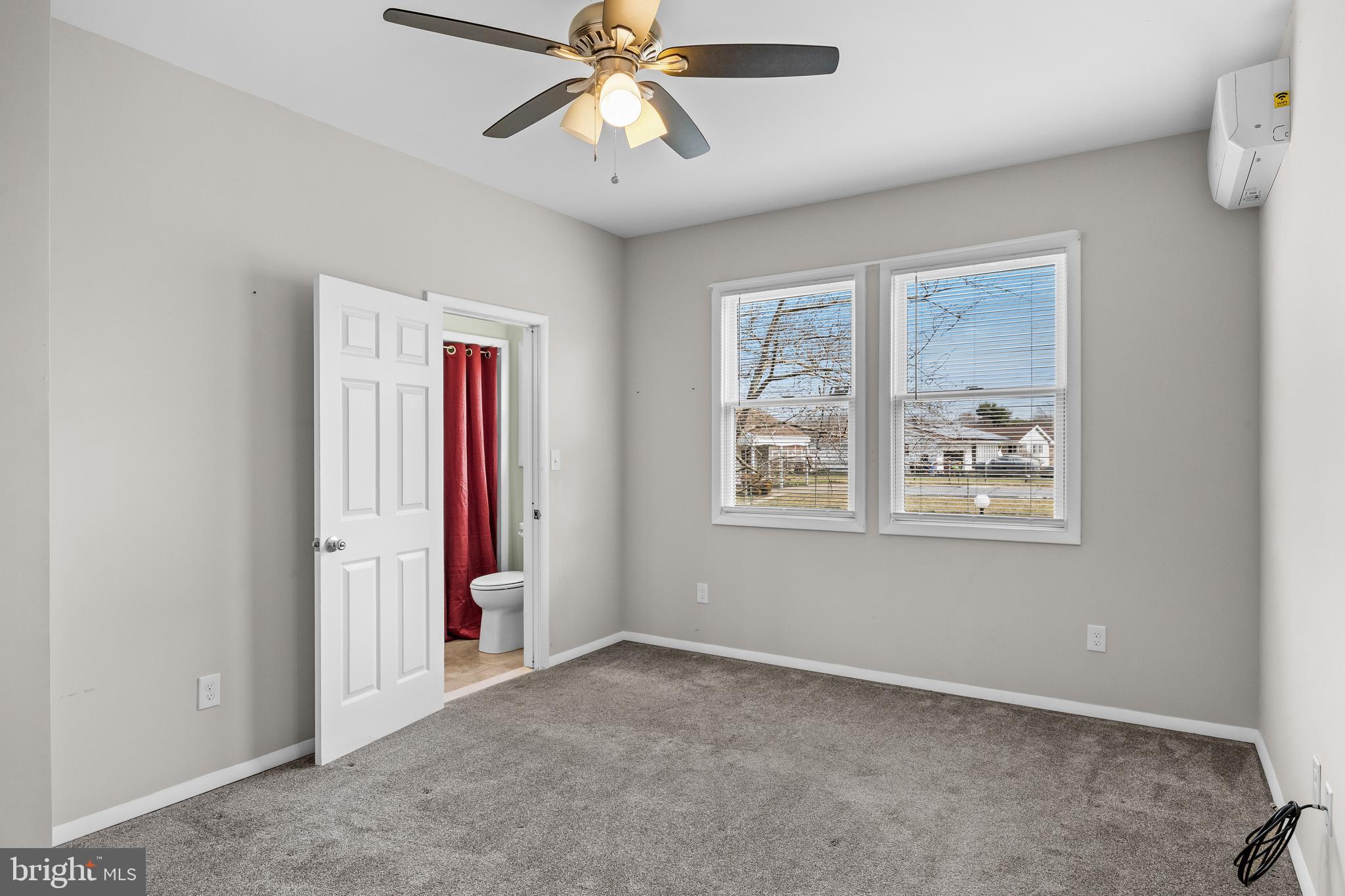 53 Arneys Mt Road Pemberton, NJ 08068 - Photo 23 of 61 an empty room with windows and fan