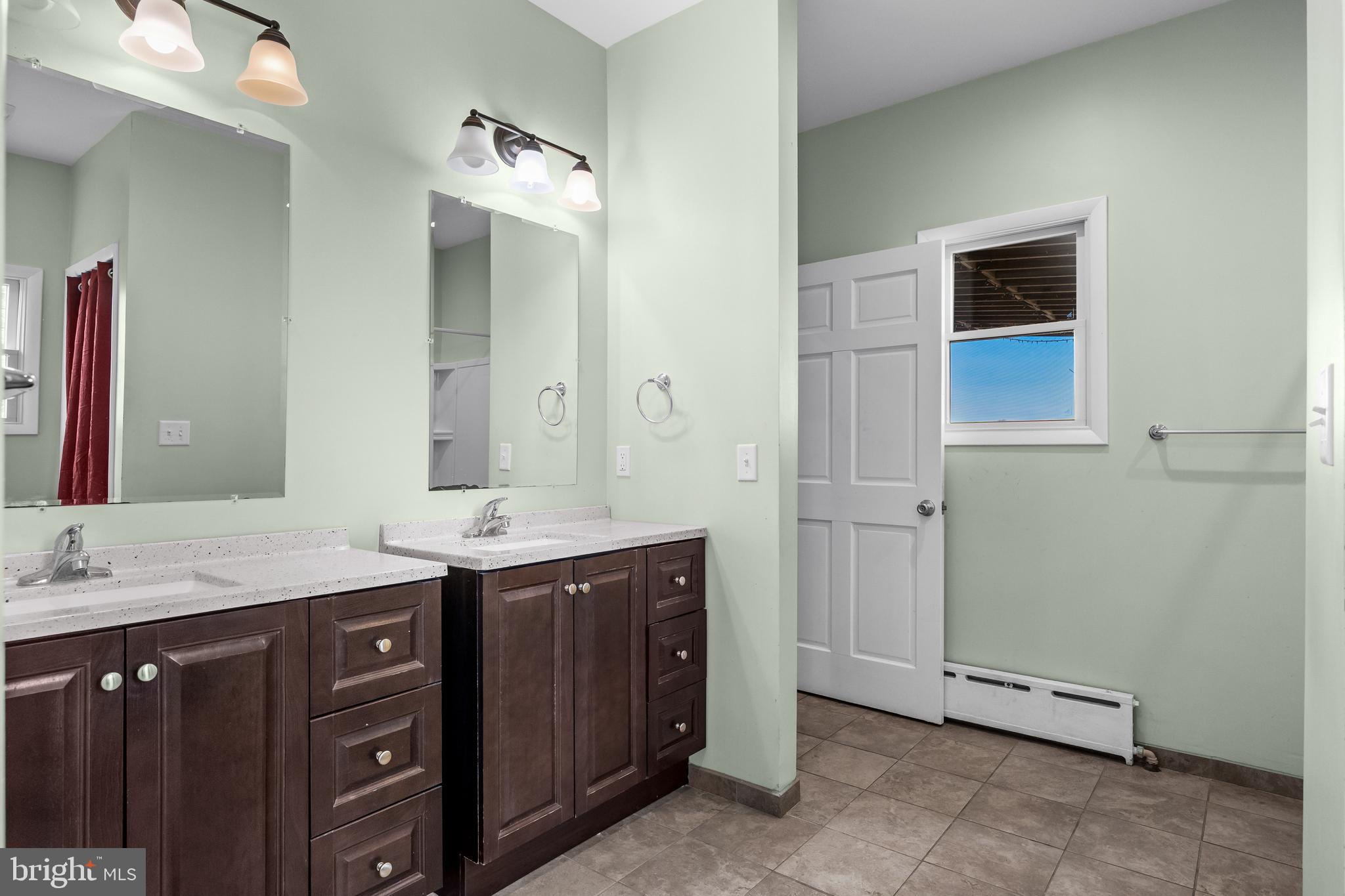53 Arneys Mt Road Pemberton, NJ 08068 - Photo 24 of 61 a bathroom with a double vanity sink and mirror