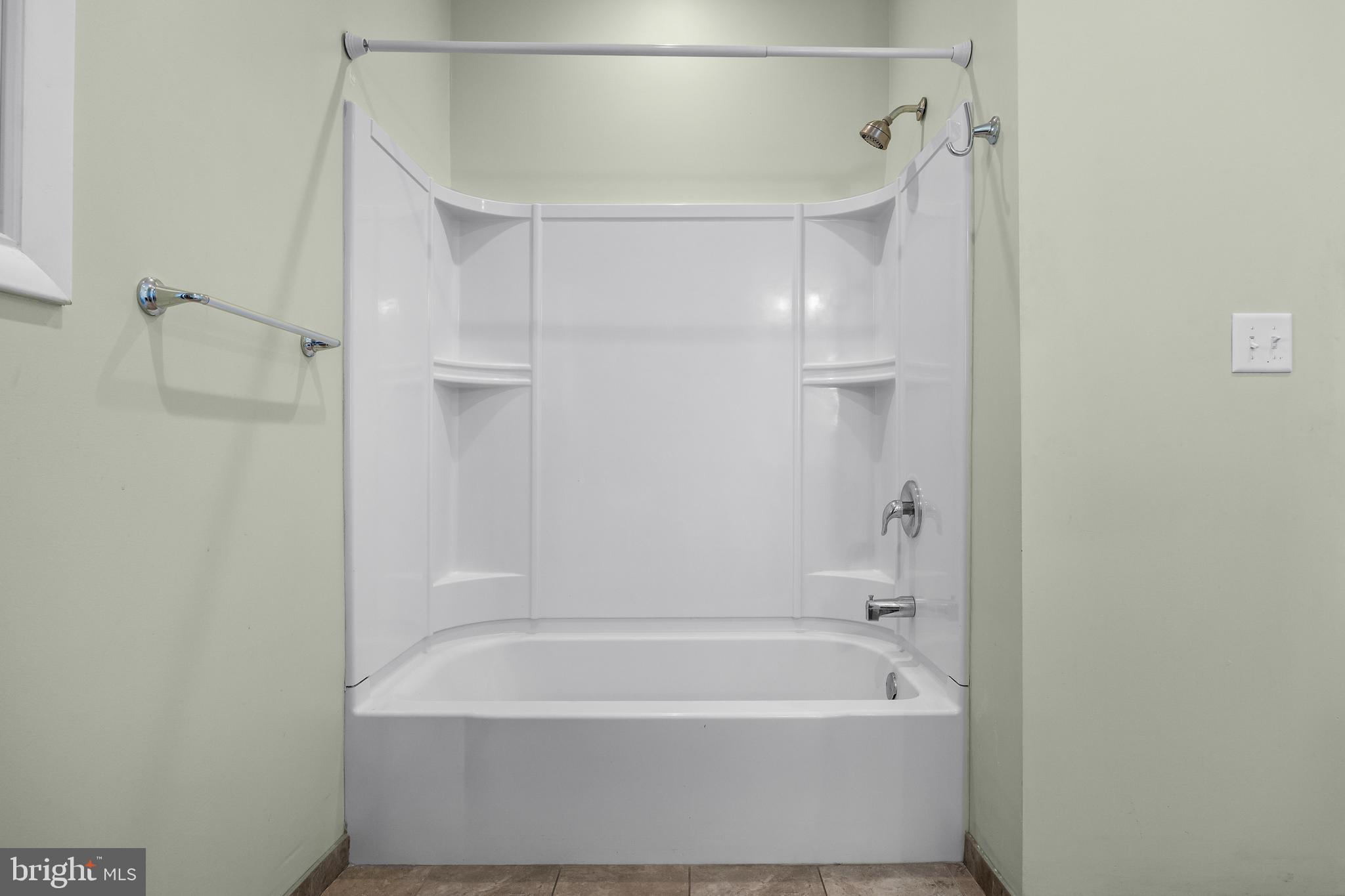 53 Arneys Mt Road Pemberton, NJ 08068 - Photo 25 of 61 a bathroom with a bathtub and shower