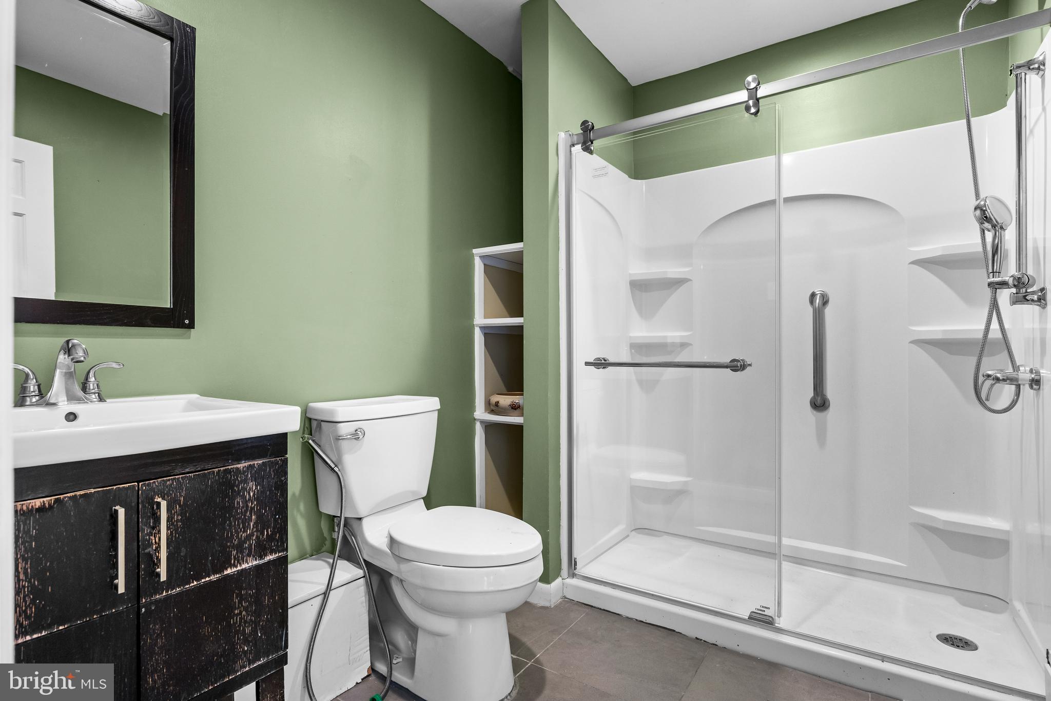 53 Arneys Mt Road Pemberton, NJ 08068 - Photo 27 of 61 a bathroom with a sink a toilet and shower
