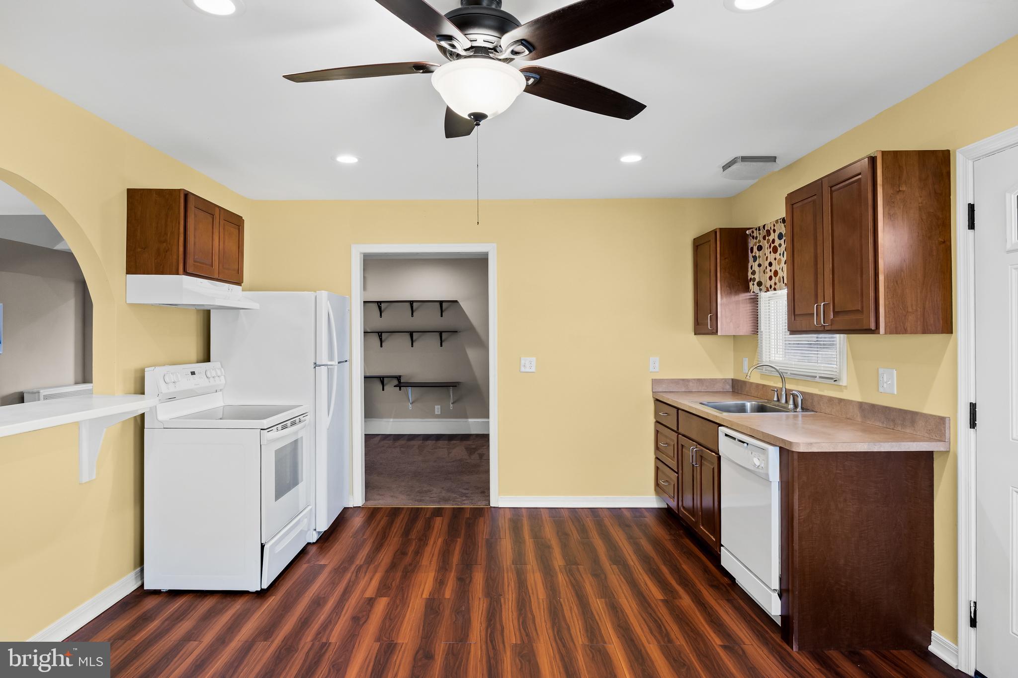 53 Arneys Mt Road Pemberton, NJ 08068 - Photo 34 of 61 a kitchen with a sink and wooden floor