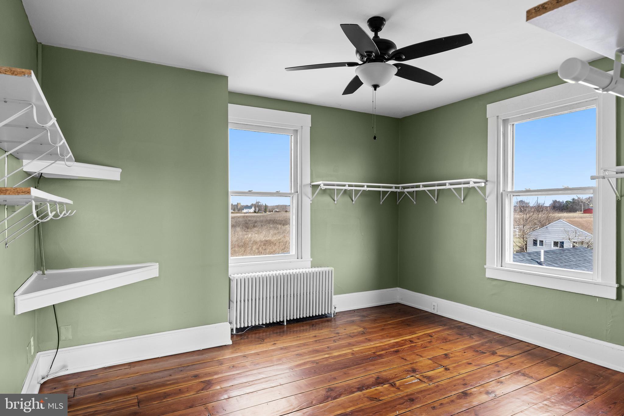 53 Arneys Mt Road Pemberton, NJ 08068 - Photo 39 of 61 a view of empty room with wooden floor and fan