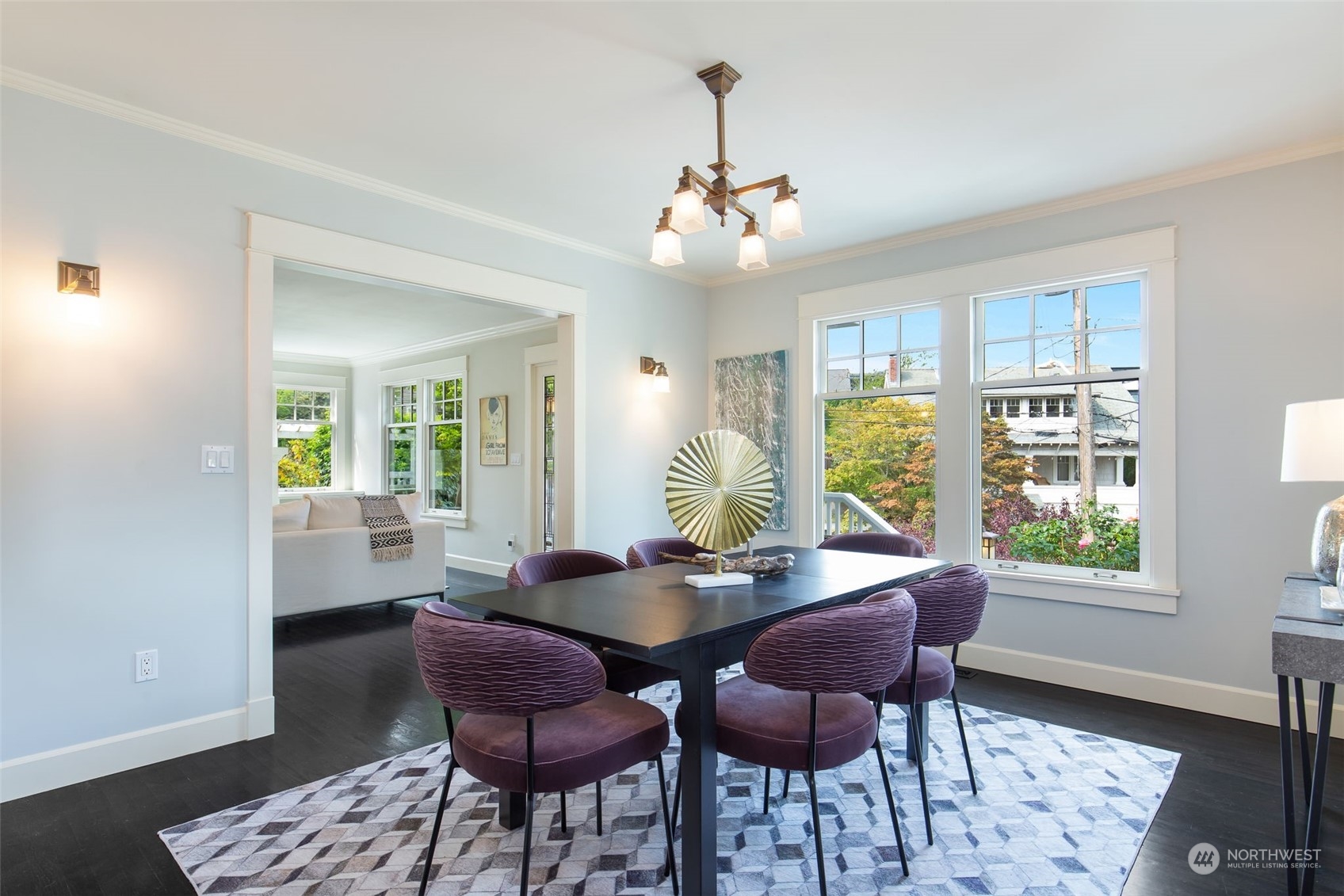3130 Broadway East Seattle, WA 98102 - Photo 11 of 32 a view of a dining room with furniture window and wooden floor