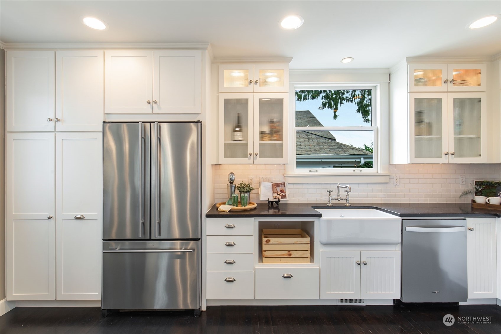 3130 Broadway East Seattle, WA 98102 - Photo 13 of 32 a kitchen with appliances a sink and a window