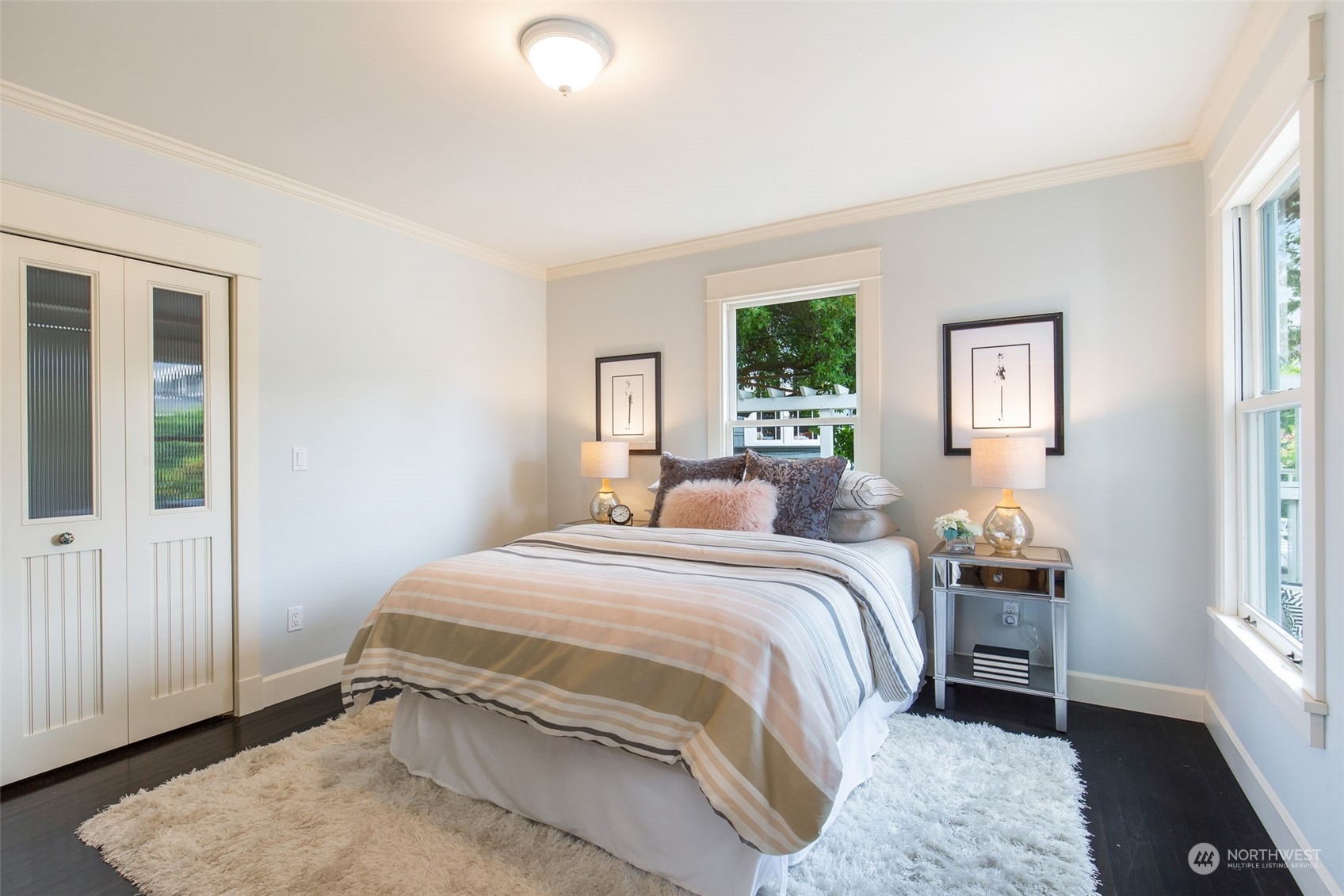 3130 Broadway East Seattle, WA 98102 - Photo 19 of 32 a bedroom with a bed and a window
