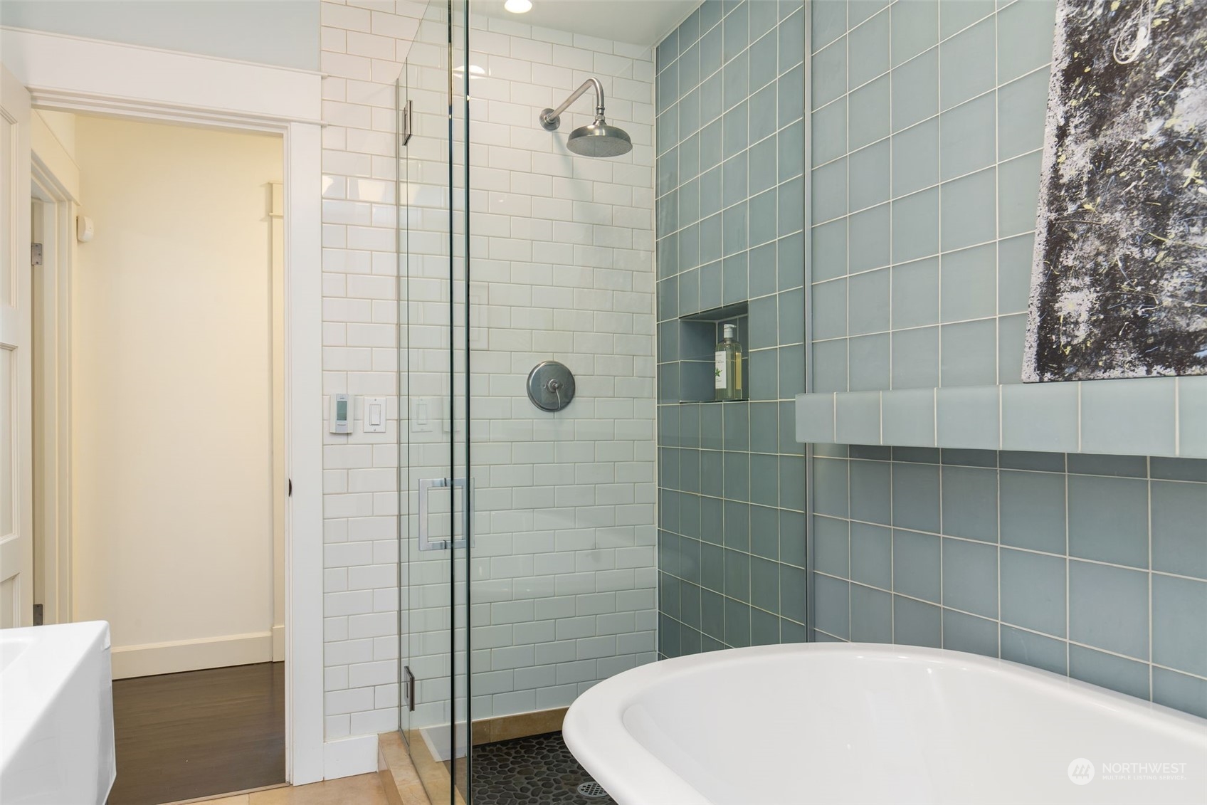 3130 Broadway East Seattle, WA 98102 - Photo 28 of 32 a bathroom with a sink and shower