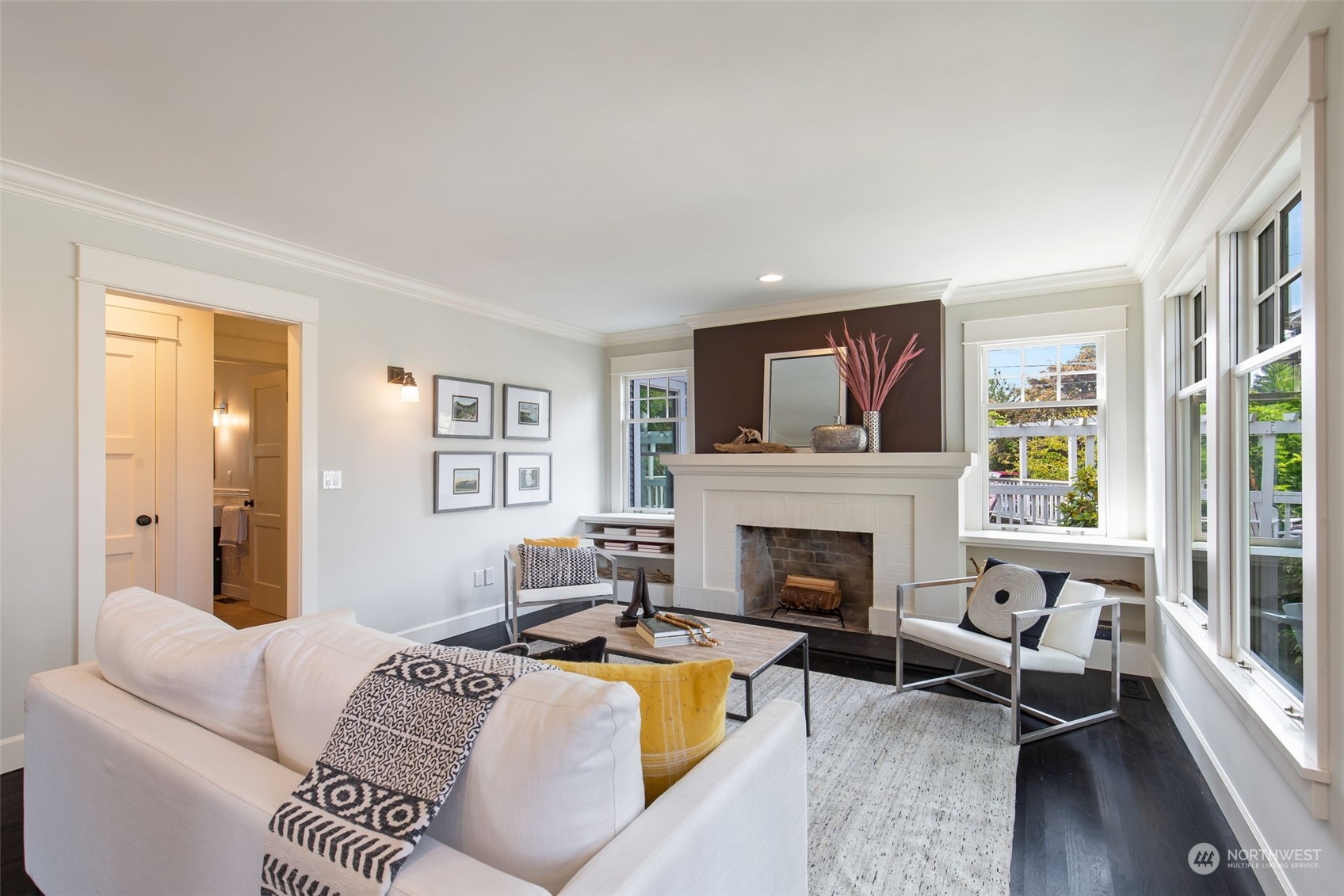 3130 Broadway East Seattle, WA 98102 - Photo 7 of 32 a living room with furniture and a fireplace
