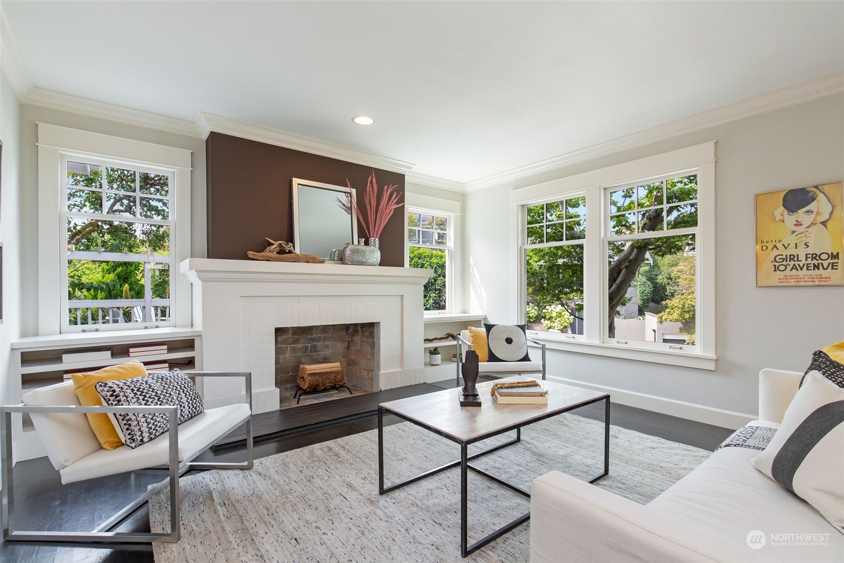 3130 Broadway East Seattle, WA 98102 - Photo 8 of 32 a living room with furniture and a fireplace