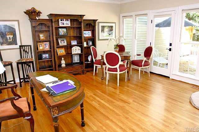 2011 Landings Way Raleigh, NC 27615 - Photo 4 of 10 a living room with furniture and a book shelf
