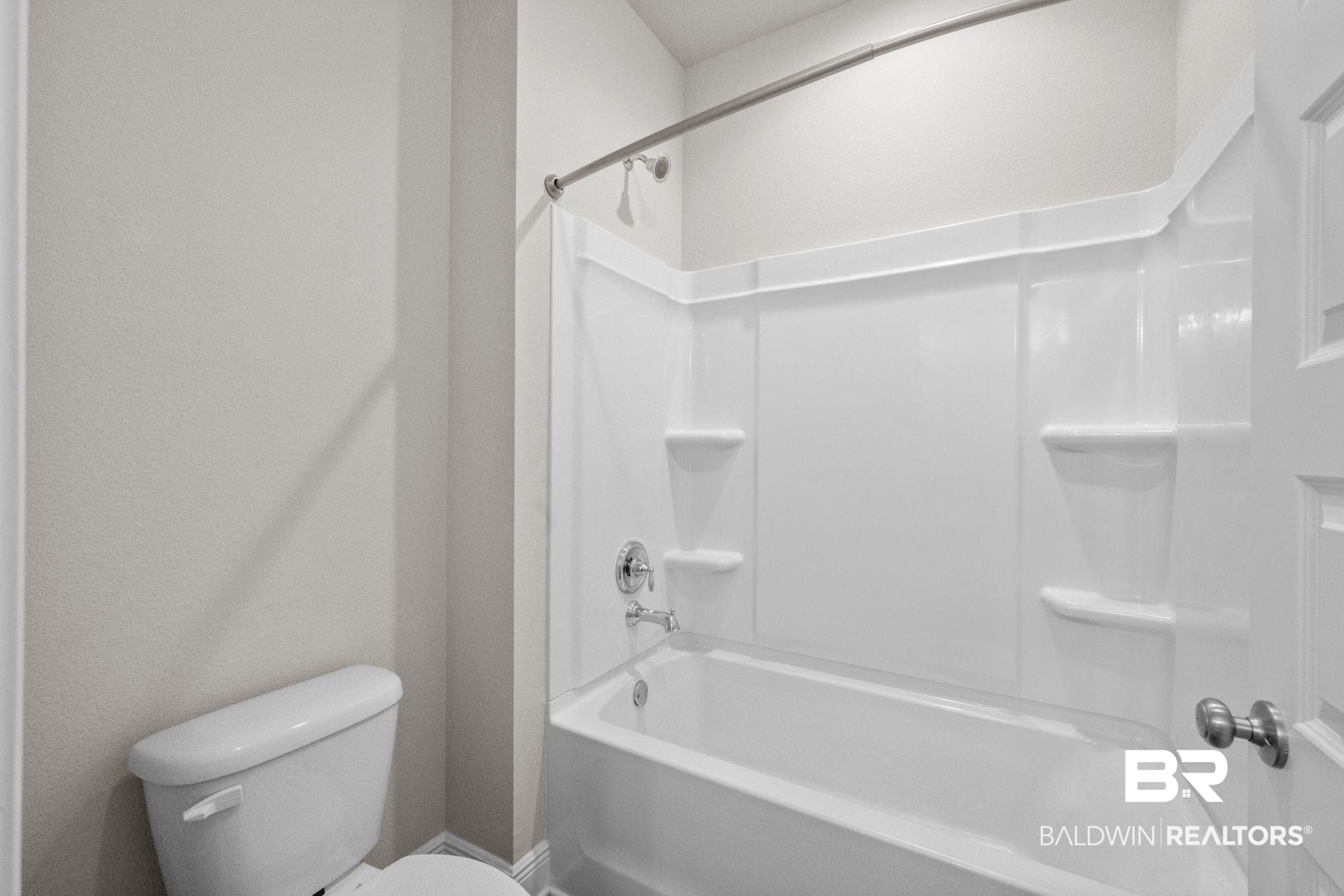 2074 Bourbon Street Foley, AL 36535 - Photo 35 of 46 Bathroom featuring toilet and washtub / shower combination