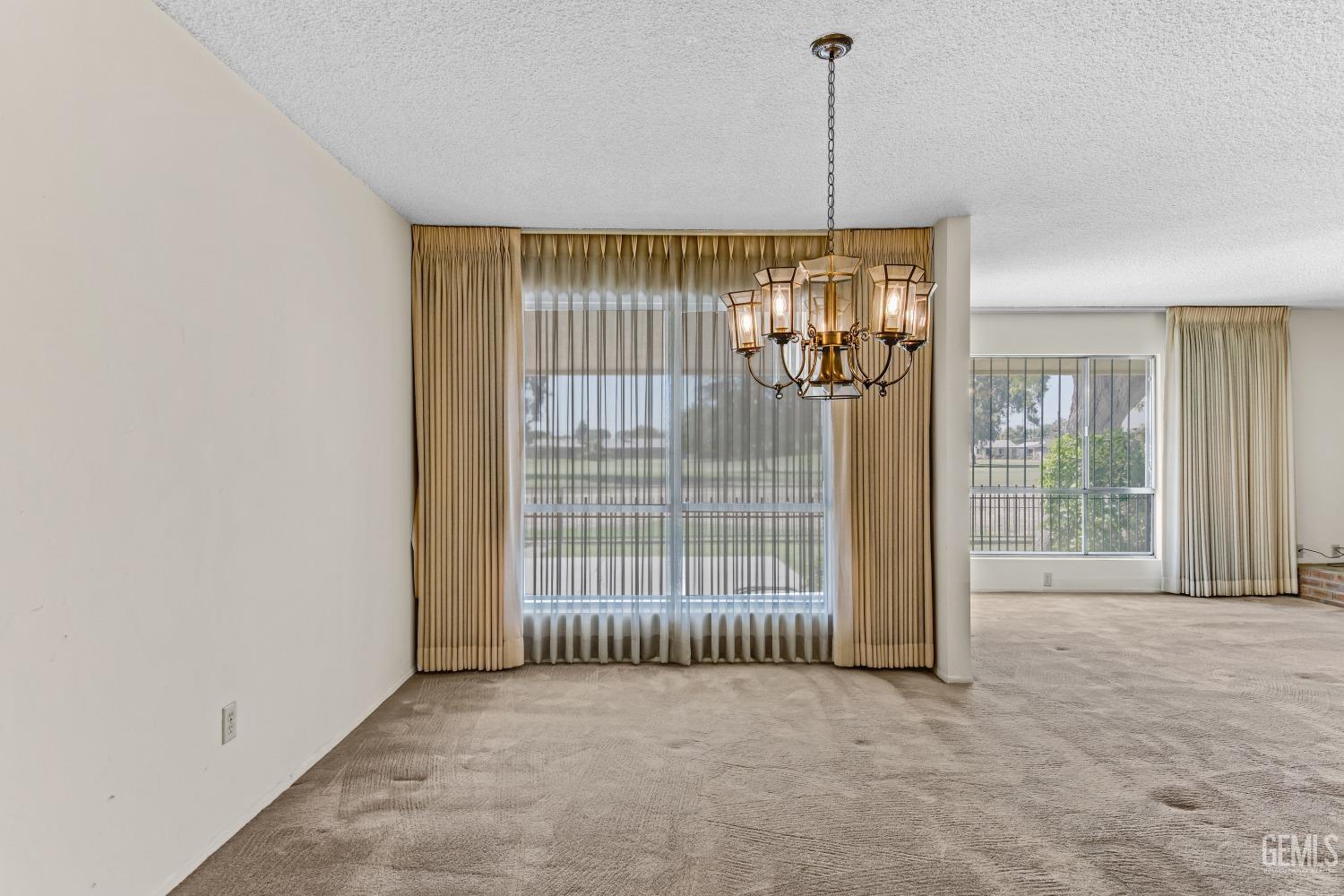 Undisclosed Address Bakersfield, CA 93309 - Photo 19 of 46 a view of a room with windows