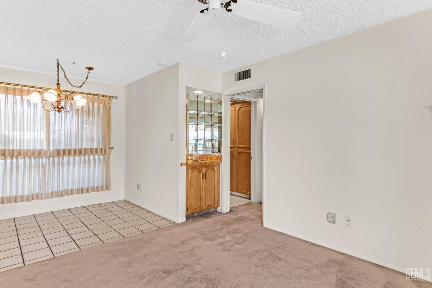 Undisclosed Address Bakersfield, CA 93309 - Photo 26 of 46 a view of an empty room with a window