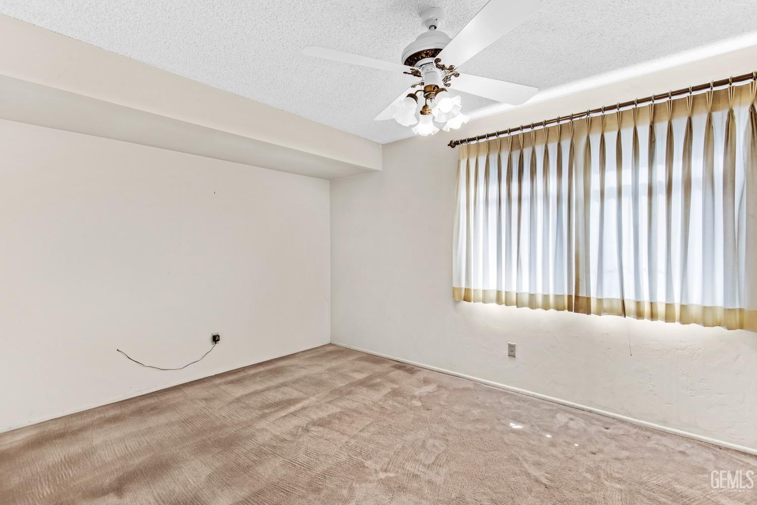 Undisclosed Address Bakersfield, CA 93309 - Photo 31 of 46 a view of an empty room with a window