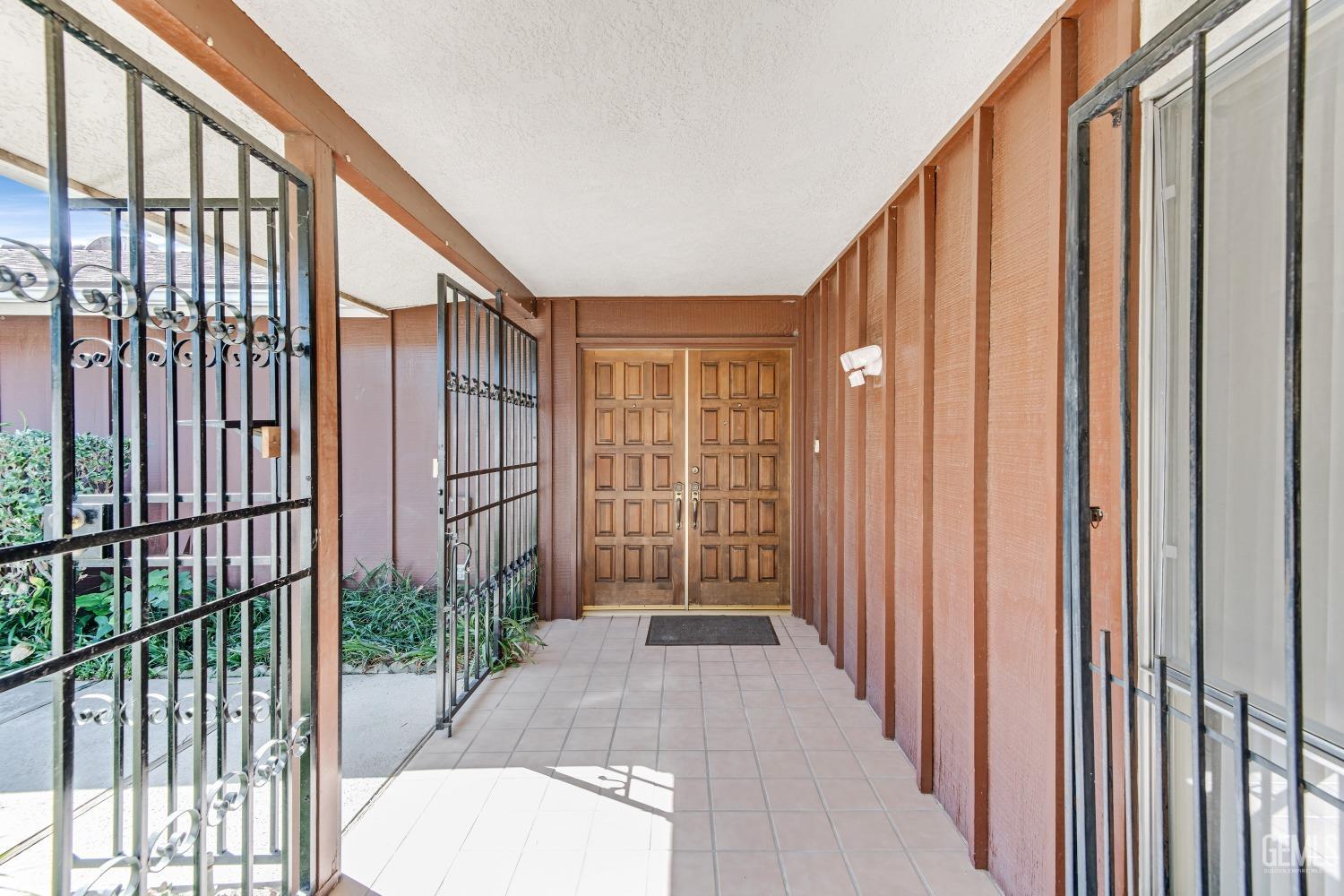 Undisclosed Address Bakersfield, CA 93309 - Photo 6 of 46 a view of a back door of a house