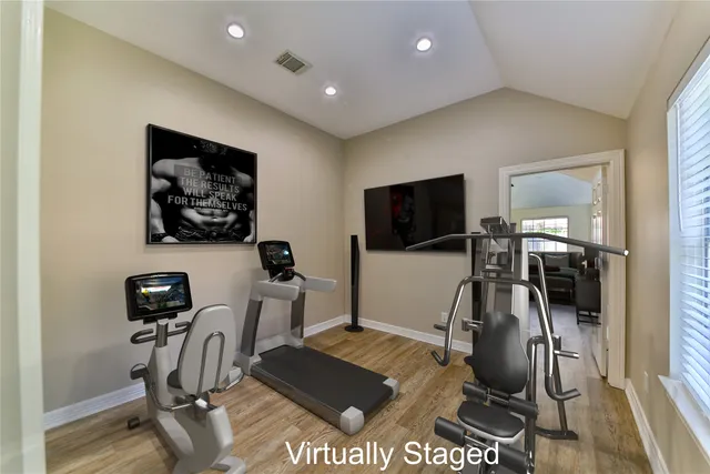 a view of a room with gym equipment