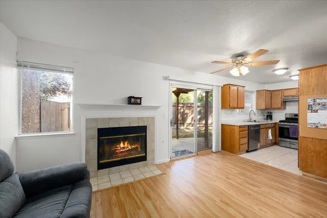 a kitchen with furniture and a fireplace
