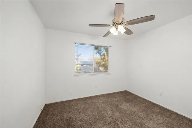 a bathroom with a sink a toilet a shower and a mirror