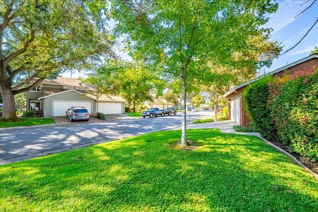 a house view with a garden space