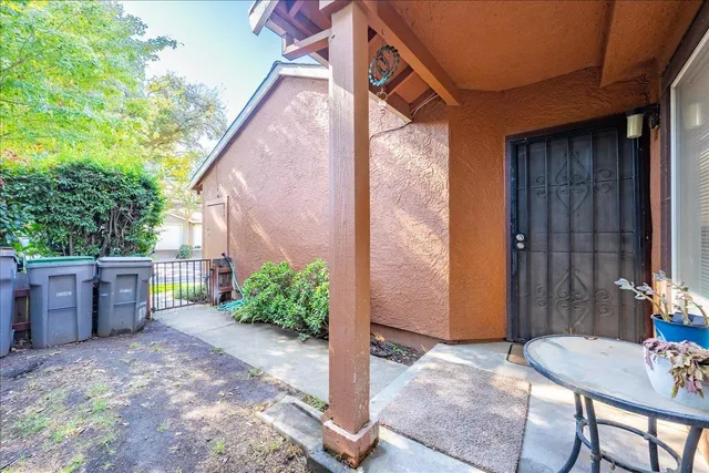 a backyard of a house with seating space
