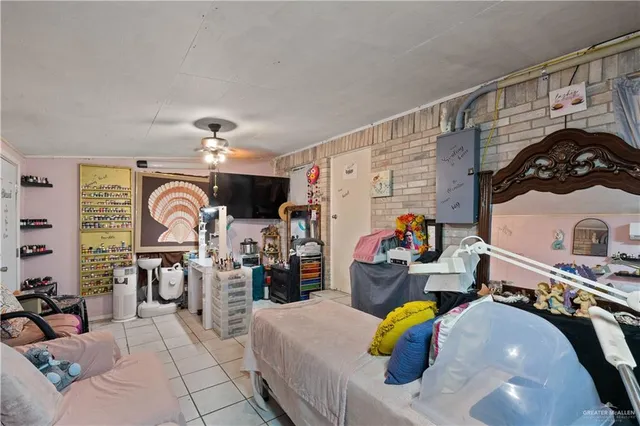 a living room filled with furniture and a chandelier