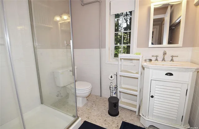 a bathroom with a sink and a toilet