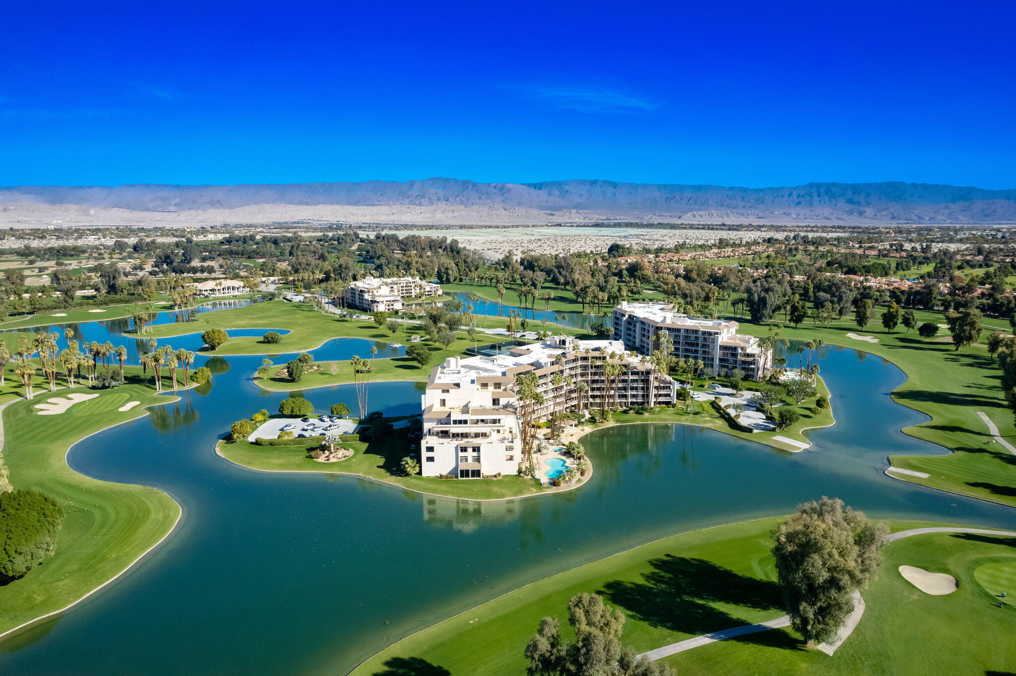 a view of a lake with a city