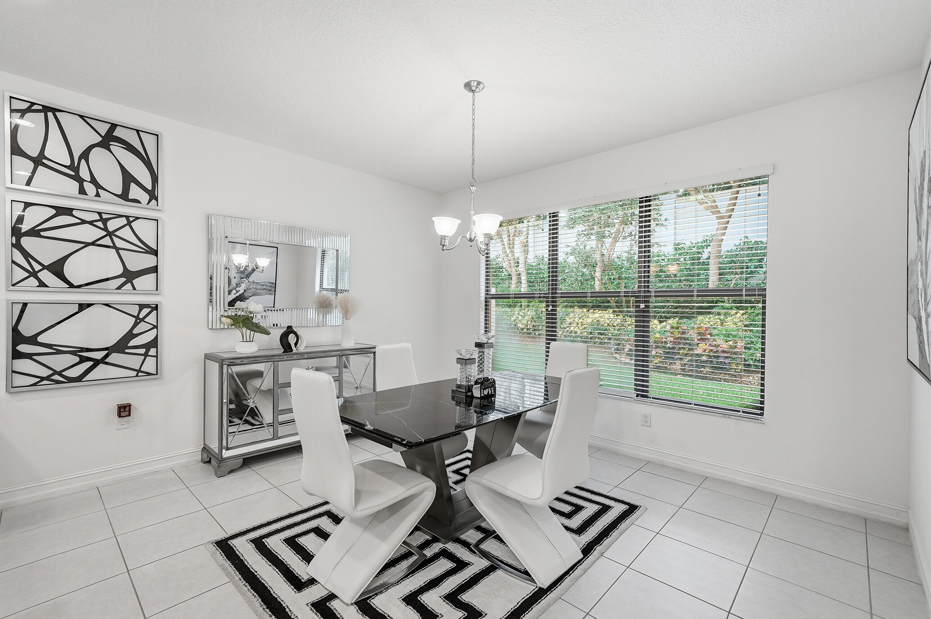 14085 Paverstone Terrace Delray Beach, FL 33446 - Photo 15 of 46 a view of a workspace with furniture and a window