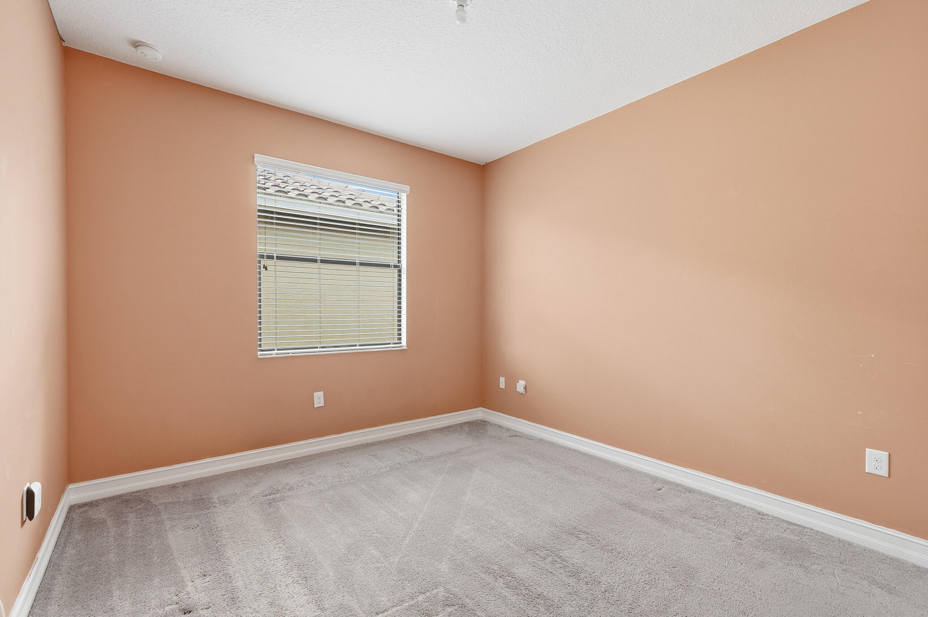 14085 Paverstone Terrace Delray Beach, FL 33446 - Photo 22 of 46 a view of an empty room with a window