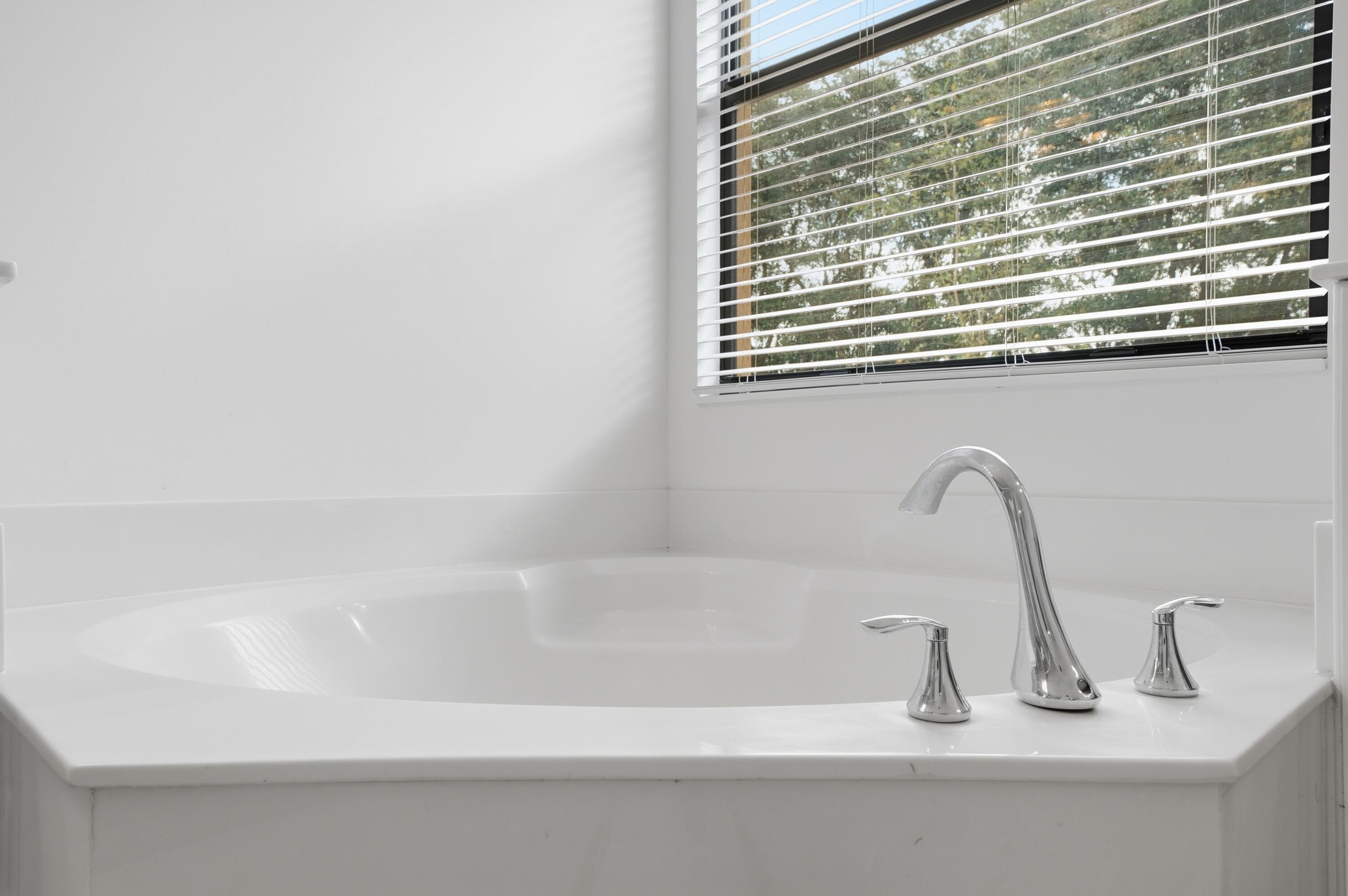 14085 Paverstone Terrace Delray Beach, FL 33446 - Photo 30 of 46 a bathroom with a sink and a window