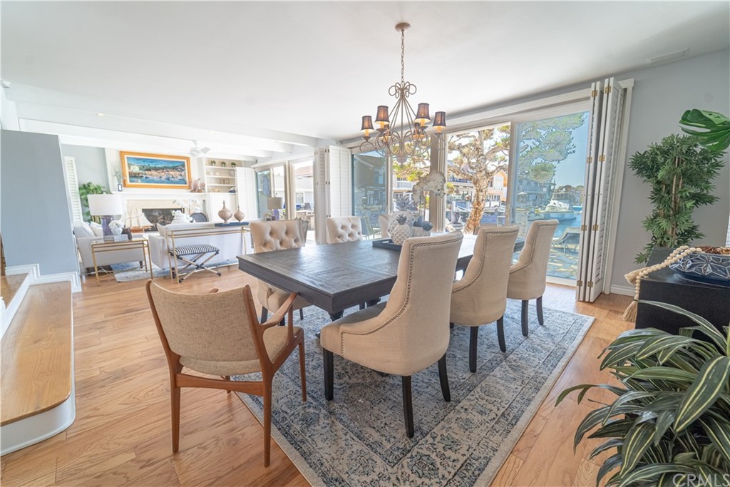 16631 Edgewater Lane Huntington Beach, CA 92649 - Photo 11 of 55 a view of a dining room with furniture window and outside view