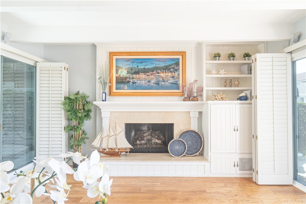 16631 Edgewater Lane Huntington Beach, CA 92649 - Photo 17 of 55 a living room with furniture and a fireplace