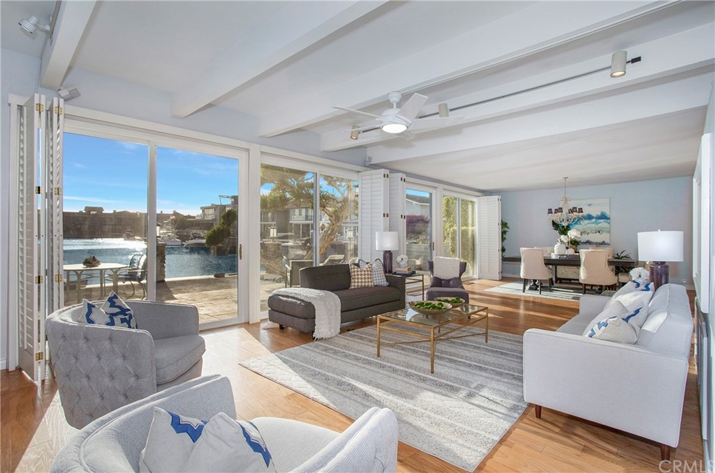 16631 Edgewater Lane Huntington Beach, CA 92649 - Photo 18 of 55 a living room with furniture and a large window