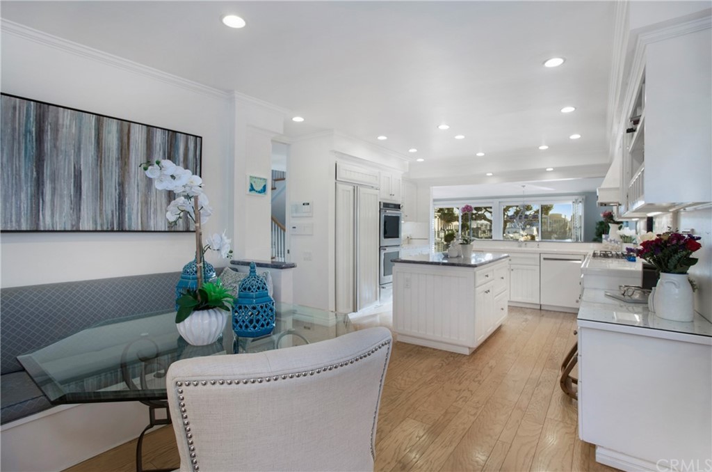 16631 Edgewater Lane Huntington Beach, CA 92649 - Photo 20 of 55 a living room with furniture and flowers