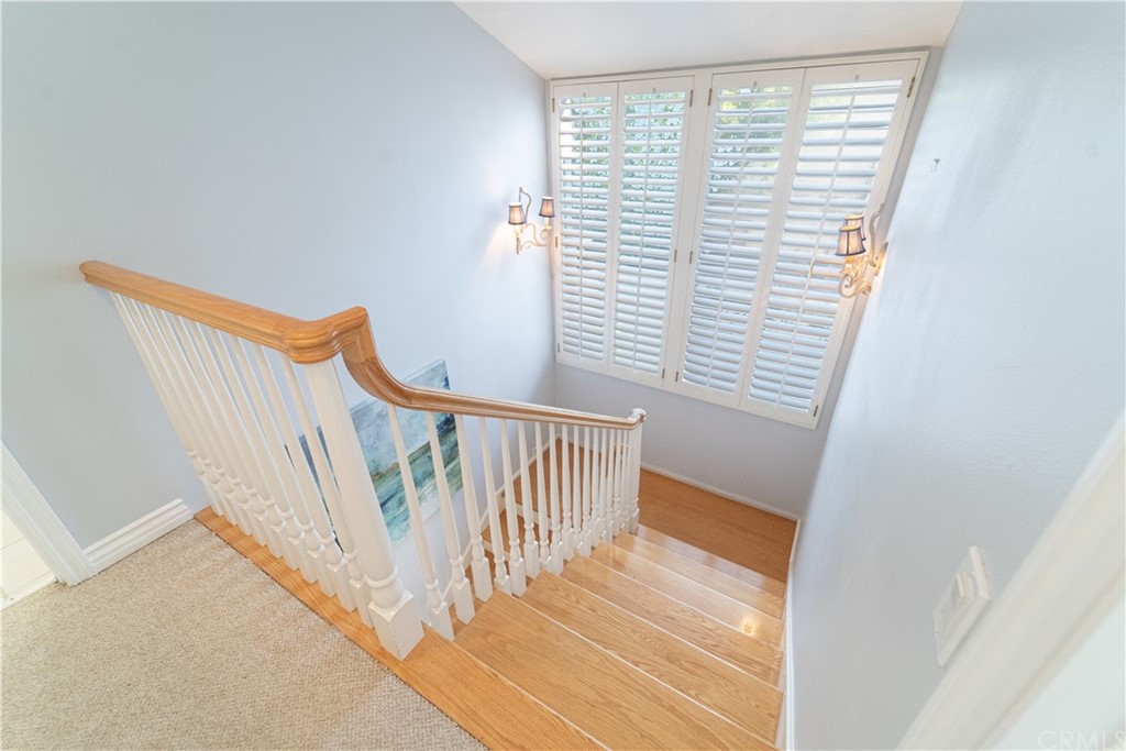 16631 Edgewater Lane Huntington Beach, CA 92649 - Photo 30 of 55 a view of a hallway with stairs